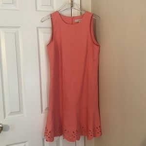 Loft dress size 2 in very good condition! Coral with cutouts at the bottom.
